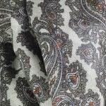 Męski szalik wełniany z wzorem paisley o wymiarach 33x170 cm, elegancki i ciepły dodatek na chłodne dni.